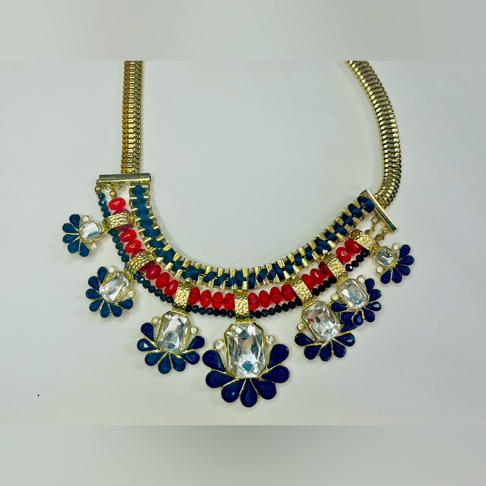 Bold and colorful costume jewelry necklace, gold toned